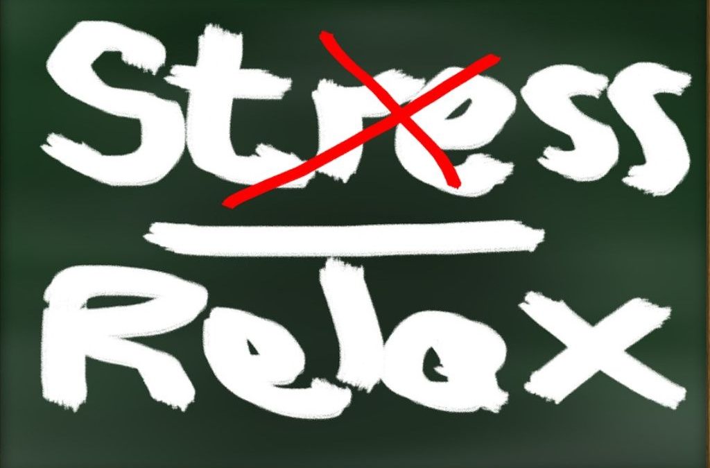 Chalkboard with 'Stress' crossed out in red and 'Relax' written below in white chalk